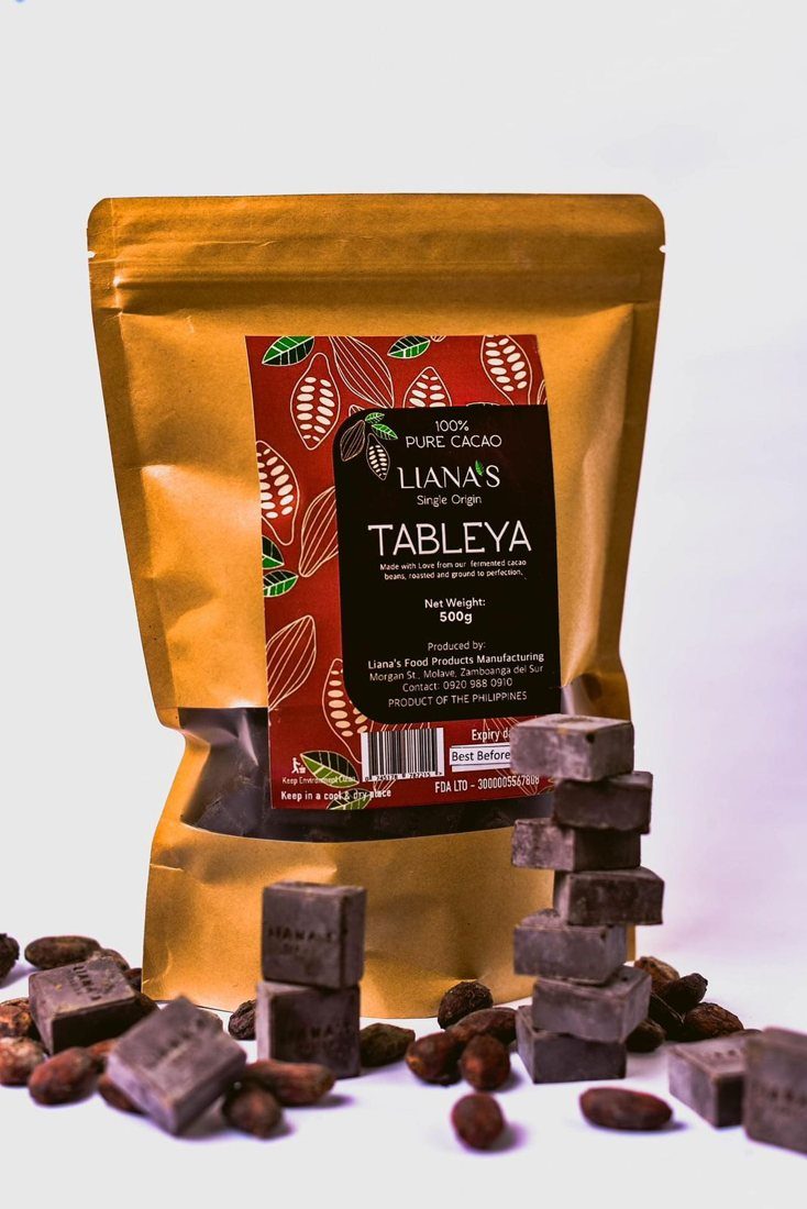 Liana's Tableya 500 g pouch with stacked tableya tablets and cacao beans